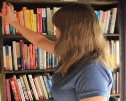 Kaynee is an avid reader and often visits the library to get some interesting things to read.